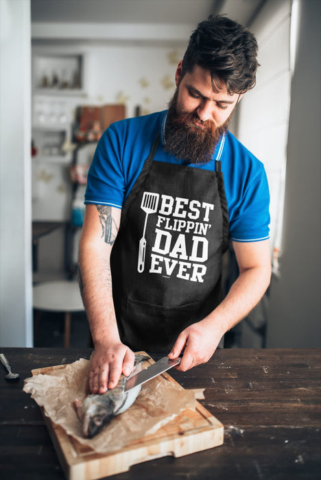 VAGAVY - Best Flippin Dad Ever Dad Apron with Pockets - Bottle Opener and Gift Box Included - Birthday, Father’s Day Grilling Gifts for Papa, Husband - Black Barbeque Apron for Daddy Men - Grill Parts America