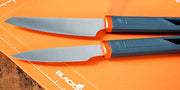 Blackstone 5433 Knife Roll Kit 1 Silicone Prep Mat, Integrated Salt and Pepper Shaker, 1 Large Prep Knife, 1 Small Prep Knife, 1 Containment Tube, Stainless Steel, Chef Travel Roll Bag/Case Orange - Grill Parts America