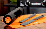 Blackstone 5433 Knife Roll Kit 1 Silicone Prep Mat, Integrated Salt and Pepper Shaker, 1 Large Prep Knife, 1 Small Prep Knife, 1 Containment Tube, Stainless Steel, Chef Travel Roll Bag/Case Orange - Grill Parts America